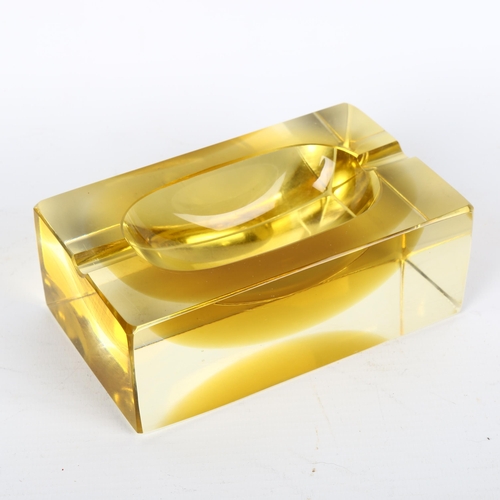 1686 - FLAVIO POLI, Murano, a 1970s' ochre sommerso cube ashtray, length 13cm