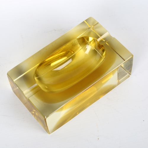 1686 - FLAVIO POLI, Murano, a 1970s' ochre sommerso cube ashtray, length 13cm