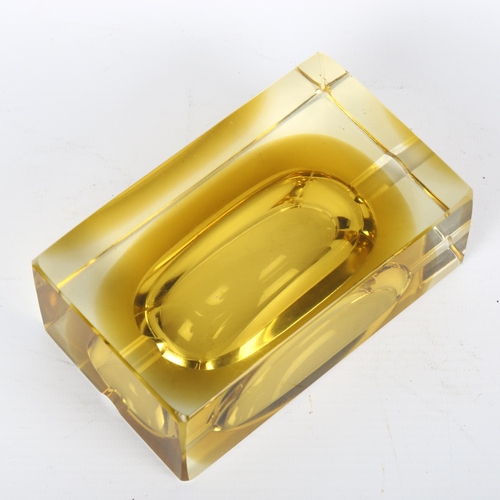 1686 - FLAVIO POLI, Murano, a 1970s' ochre sommerso cube ashtray, length 13cm