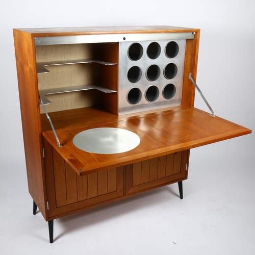 1713 - HANSEN and GULDBERG, (HG Furniture), a 1960s' Danish teak cocktail cabinet with Zinc interior detail... 