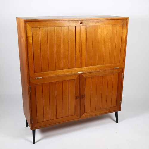 1713 - HANSEN and GULDBERG, (HG Furniture), a 1960s' Danish teak cocktail cabinet with Zinc interior detail... 