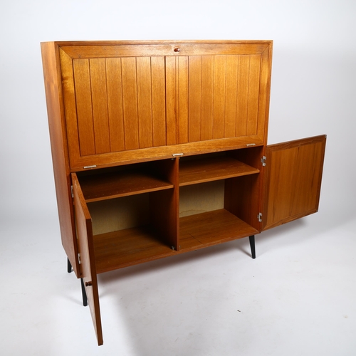 1713 - HANSEN and GULDBERG, (HG Furniture), a 1960s' Danish teak cocktail cabinet with Zinc interior detail... 