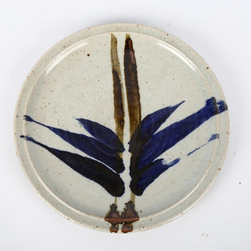 1715 - BRYAN and JULIA NEWMAN, an ALLER studio pottery plate, diameter 26.5cm