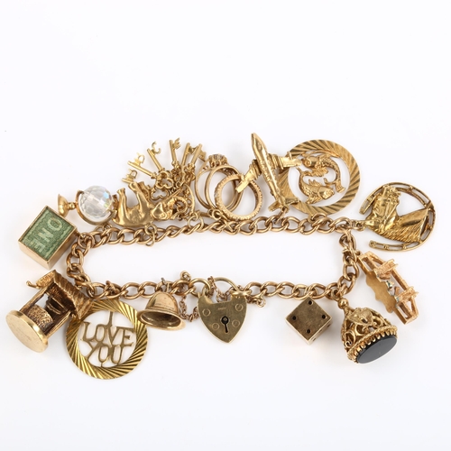 54 - CHARITY LOT (SOLD ON BEHALF OF SARA LEE TRUST) - a mid-20th century 9ct gold curb link charm bracele... 