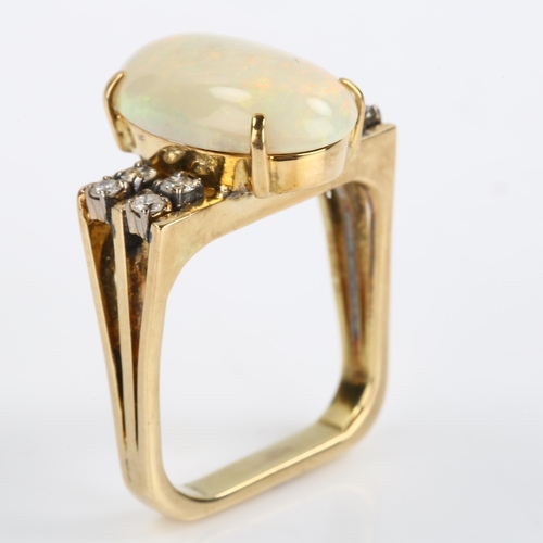 58 - A 1970s opal and diamond dress ring, unmarked gold square shank set with oval cabochon opal and mode... 