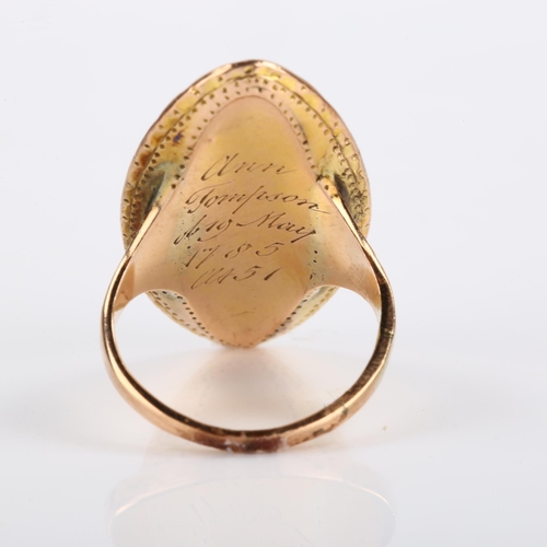 69 - A Georgian marquise mourning ring, unmarked gold closed-back settings, with central hair panel under... 