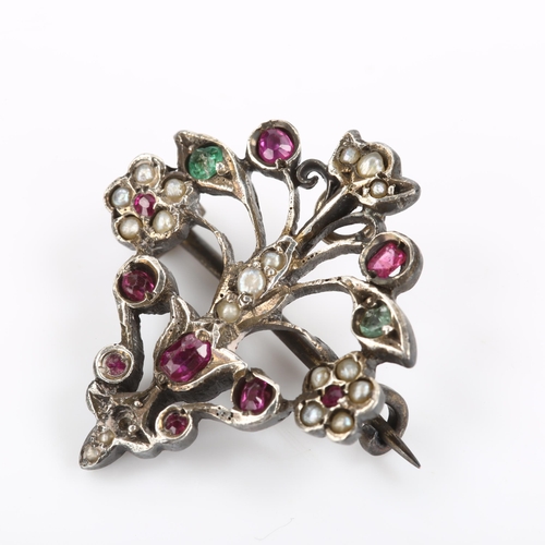 79 - An Austro-Hungarian ruby emerald and pearl giardinetti pendant/brooch, unmarked silver settings mode... 