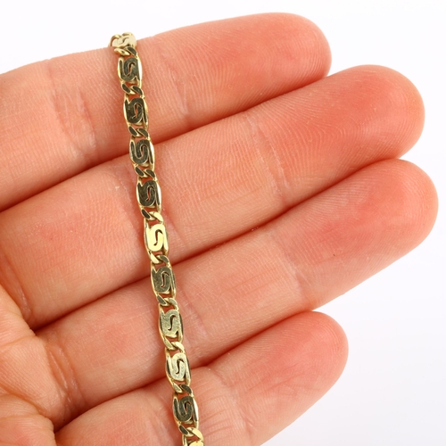 84 - KOSUN - a Turkish 14ct gold fancy link chain bracelet, length 19cm, 7g