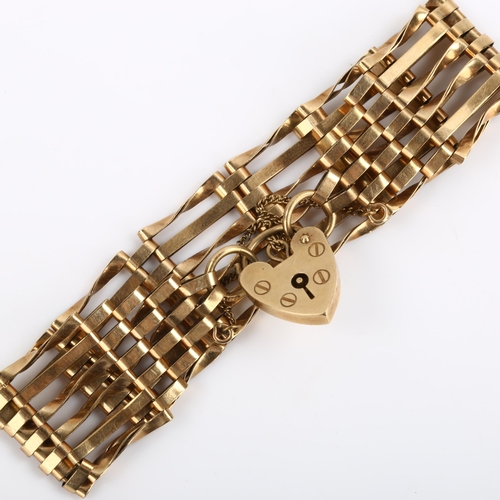 85 - A late 20th century 9ct gold gatelink bracelet, with heart padlock clasp, hallmarks London 1975, bra... 