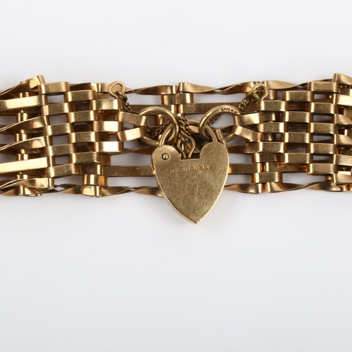 85 - A late 20th century 9ct gold gatelink bracelet, with heart padlock clasp, hallmarks London 1975, bra... 