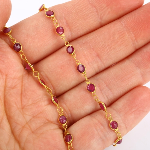 89 - A 14ct gold ruby line necklace, bezel set with round-cut rubies, necklace length 46cm, 4.9g