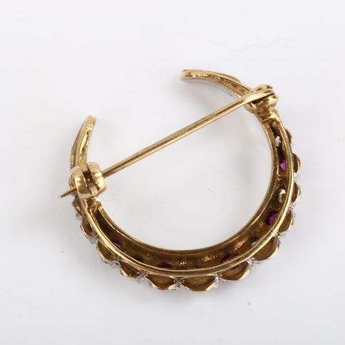 91 - A late 20th century 9ct gold ruby and diamond crescent brooch, set with round-cut stones, total diam... 