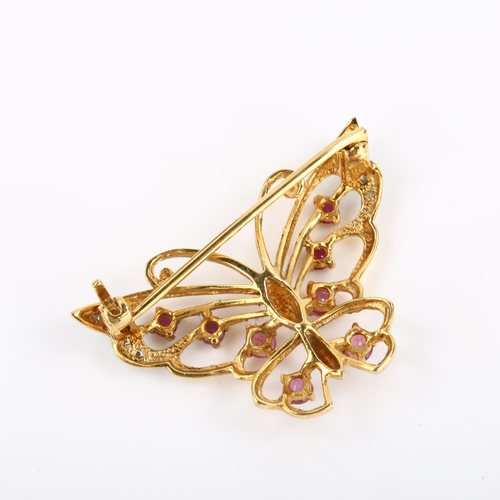 95 - A late 20th century 9ct gold ruby and diamond figural butterfly brooch, openwork settings with round... 