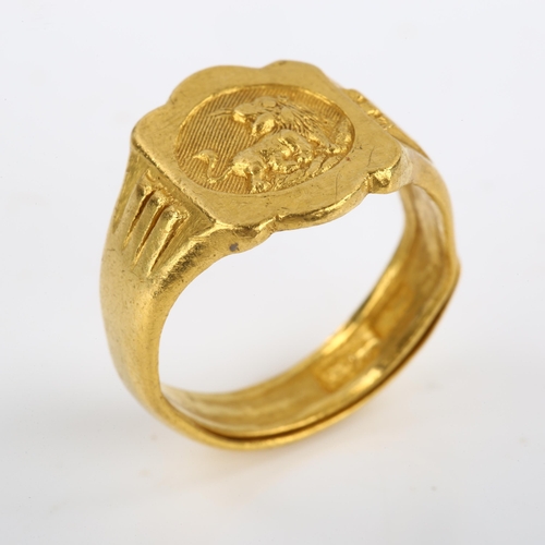 100 - A Chinese gold lion signet ring, stamped with maker's mark, setting height 14mm, size N, 8.3g