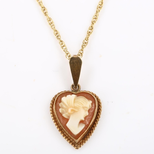 106 - A mid-20th century 9ct gold shell cameo heart pendant necklace, depicting female profile, on 9ct fin... 