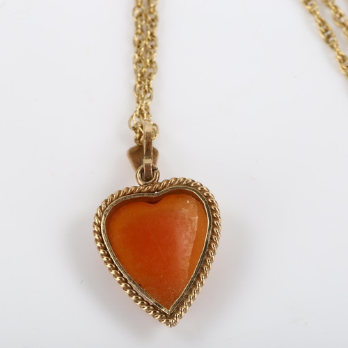 106 - A mid-20th century 9ct gold shell cameo heart pendant necklace, depicting female profile, on 9ct fin... 