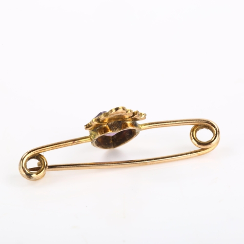 107 - An early 20th century amethyst and pearl sweetheart bar brooch, unmarked gold settings with heart-cu... 