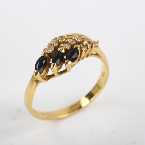 109 - An 18ct gold sapphire and diamond dress ring, set with marquise sapphire and round brilliant-cut dia... 