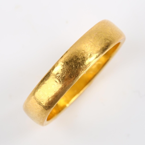 110 - A late 20th century 22ct gold wedding band ring, maker's marks JJ, hallmarks London 1978, band width... 