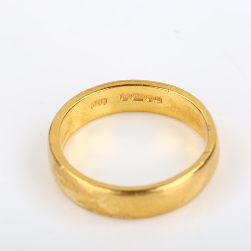 110 - A late 20th century 22ct gold wedding band ring, maker's marks JJ, hallmarks London 1978, band width... 