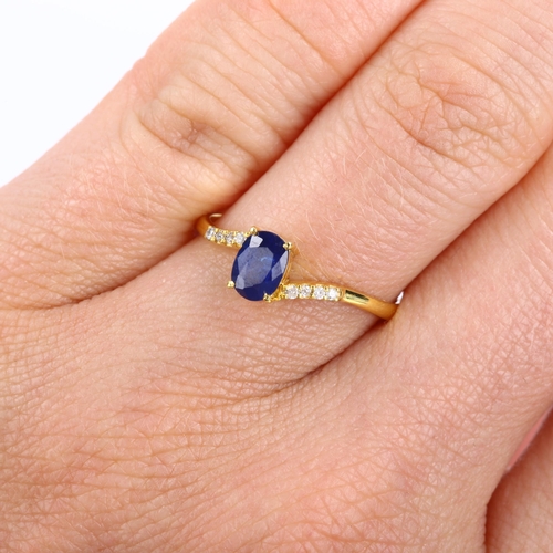 114 - A modern 14ct gold sapphire and diamond crossover ring, set with oval mixed-cut sapphire and modern ... 