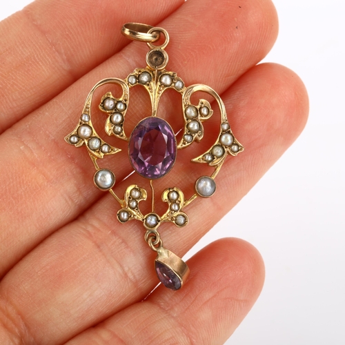 115 - An Edwardian 9ct rose gold amethyst and pearl openwork pendant necklace, on later 9ct fine figaro li... 