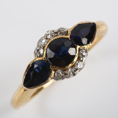 116 - A sapphire and diamond cluster ring, unmarked gold settings with round and pear-cut sapphires and ol... 