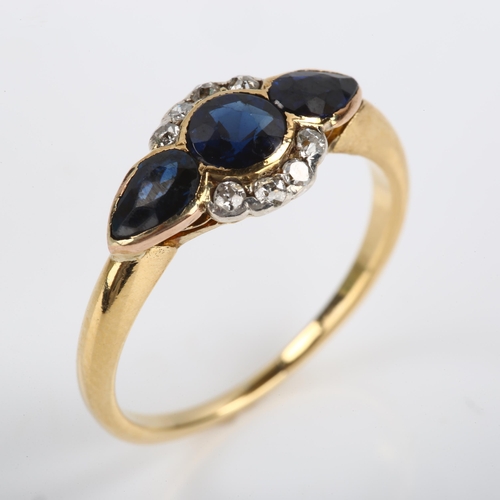 116 - A sapphire and diamond cluster ring, unmarked gold settings with round and pear-cut sapphires and ol... 