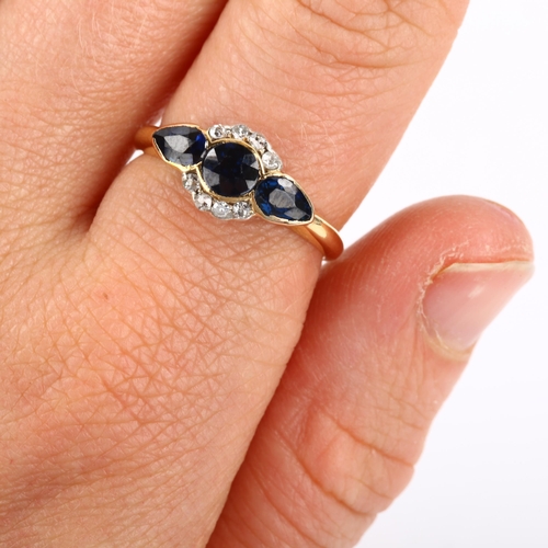 116 - A sapphire and diamond cluster ring, unmarked gold settings with round and pear-cut sapphires and ol... 