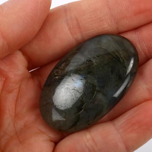 263 - An unmounted 76.40ct oval cabochon labradorite, 43.23mm x 27.42mm x 7.86mm, with IDT gemstone report... 