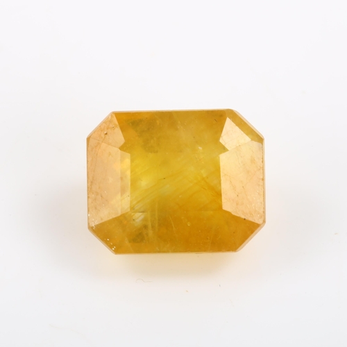 267 - An unmounted 7.63ct octagonal step-cut yellow sapphire, 10.81mm x 8.72mm x 6.78mm, with ITLGR report... 