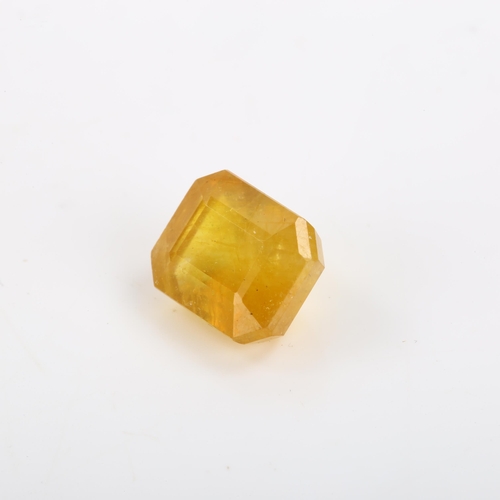 267 - An unmounted 7.63ct octagonal step-cut yellow sapphire, 10.81mm x 8.72mm x 6.78mm, with ITLGR report... 