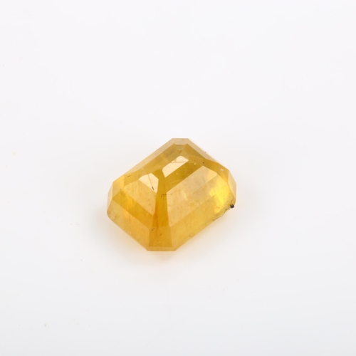 267 - An unmounted 7.63ct octagonal step-cut yellow sapphire, 10.81mm x 8.72mm x 6.78mm, with ITLGR report... 