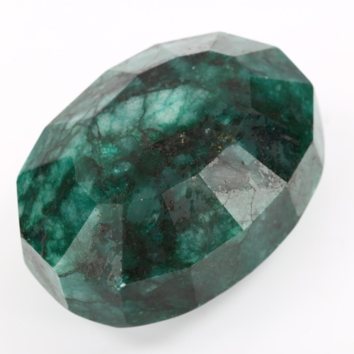 268 - A large unmounted 574ct oval mixed-cut Brazilian emerald, 58.35mm x 42.20mm x 29.55mm, with GLI repo... 