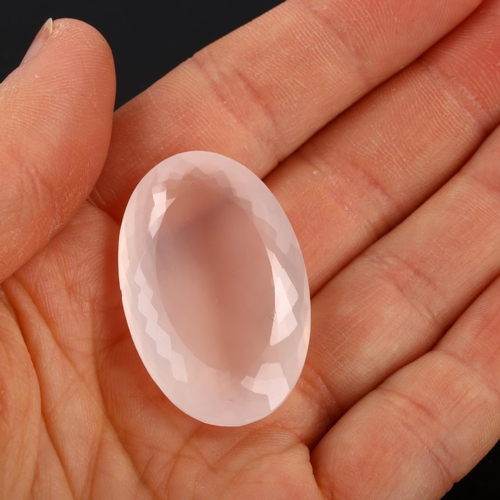 270 - A large unmounted 63.80ct oval cabochon rose quartz, 28.16mm x 23.30mm x 12.45mm, with ITLGR report ... 