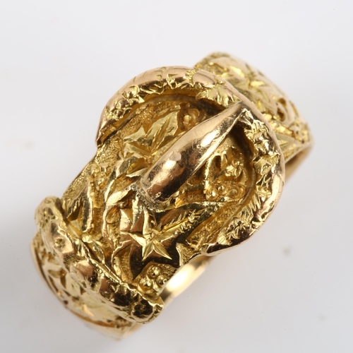 277 - An early 20th century 18ct gold belt buckle band ring, allover floral engraved decoration, maker's m... 