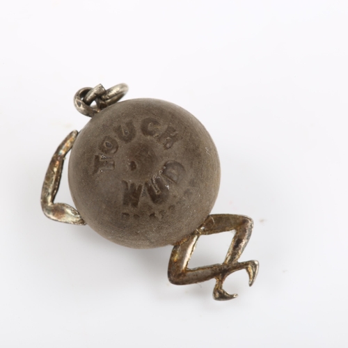 282 - A First World War Period Touch Wud soldier's good luck charm, turned wood bead body with silver moun... 