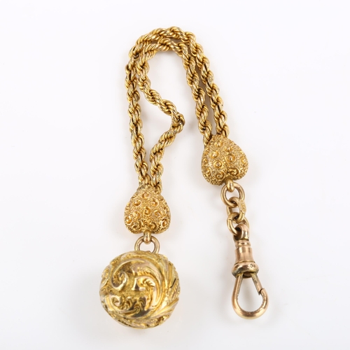 287 - An Antique 9ct gold short fob chain, with foliate ball pendant and heart terminals with dog clip, le... 