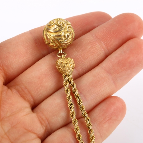 287 - An Antique 9ct gold short fob chain, with foliate ball pendant and heart terminals with dog clip, le... 