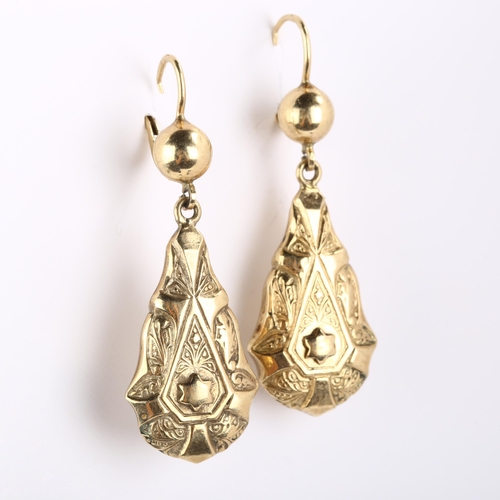 289 - A pair of 9ct gold pendant earrings, relief embossed decoration with lock fittings, earring height 5... 