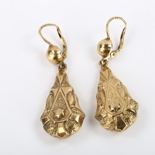 289 - A pair of 9ct gold pendant earrings, relief embossed decoration with lock fittings, earring height 5... 