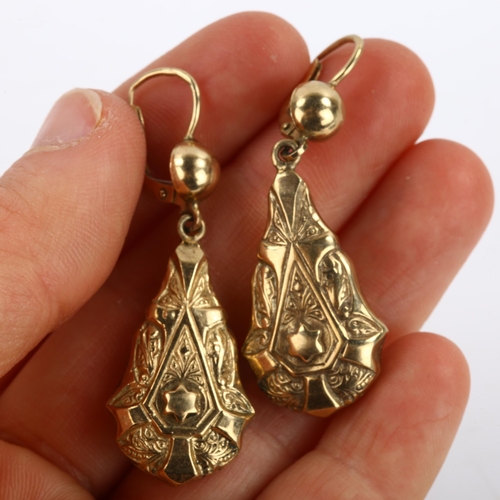 289 - A pair of 9ct gold pendant earrings, relief embossed decoration with lock fittings, earring height 5... 