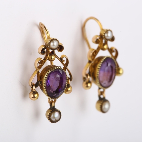 290 - A pair of early 20th century 15ct gold amethyst and pearl earrings with en tremblant drops and sheph... 