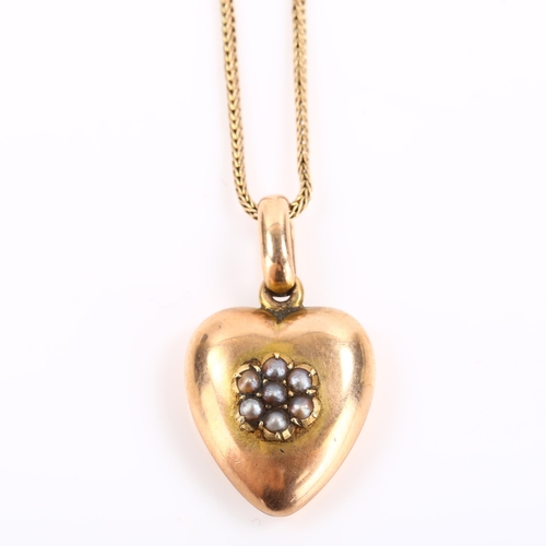 292 - An Antique 9ct rose gold pearl heart memorial pendant necklace, with woven hair panel backing under ... 