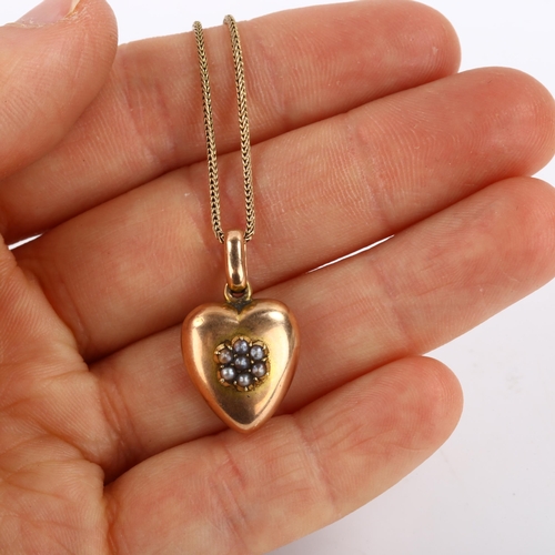 292 - An Antique 9ct rose gold pearl heart memorial pendant necklace, with woven hair panel backing under ... 