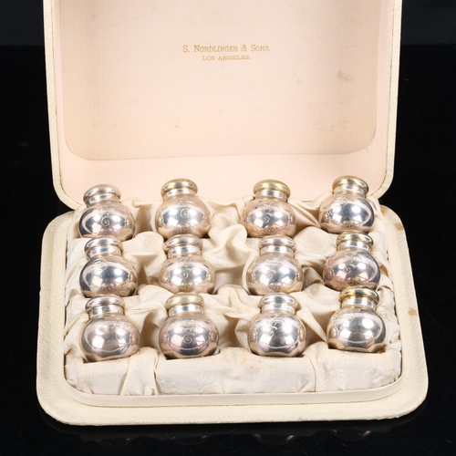 306 - GORHAM - a set of 12 American sterling silver pepperettes, model no. A3134, height 3.5cm, 3.8oz tota... 