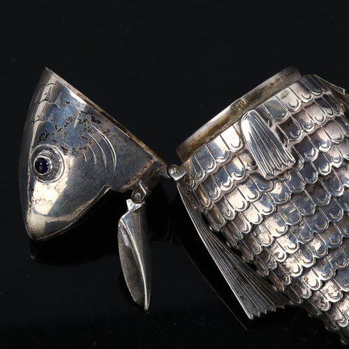 308 - A Continental silver articulated fish box, with blue glass eyes and secondary mouth compartment, mak... 