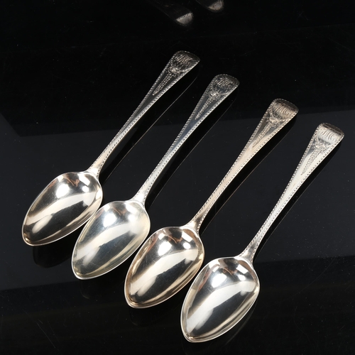 317 - A set of 4 George III silver Old English pattern dinner spoons, with bright-cut engraved decoration,... 