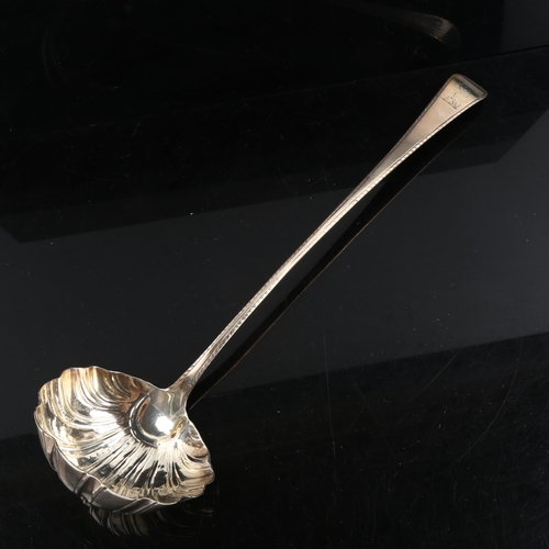 321 - A George III silver Old English pattern punch ladle, with feathered edge and shell bowl, maker's mar... 