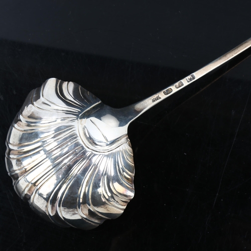 321 - A George III silver Old English pattern punch ladle, with feathered edge and shell bowl, maker's mar... 